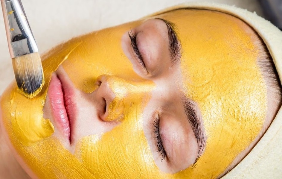 woman in spa salon lying on the massage desk